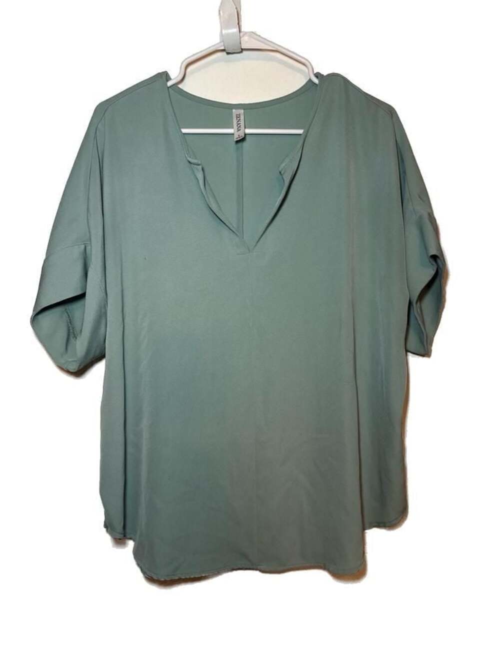 Zenana Woven Airflow Split Neck Short Sleeve Dolman Top